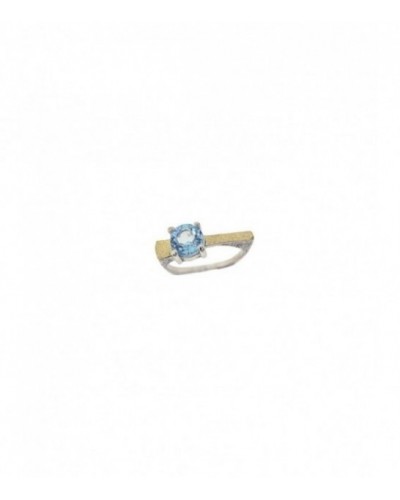 Anillo de plata y oro con topacio azul. - 22193