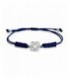 Polsera plata flor de Brcelona amb macramé blau. - PUJ006SPMA
