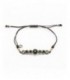 Polsera de plata i macramé amb onix i circonites. - MA-359